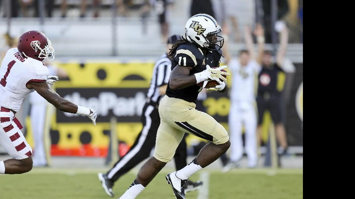 
UCF receiver Breshad Perriman hauls in a pass for a touchdown after slipping by Tavon Young from Temple during their game against the Temple Owls at Bright House Networks Stadium in Orlando on Saturday, October 25, 2014.
