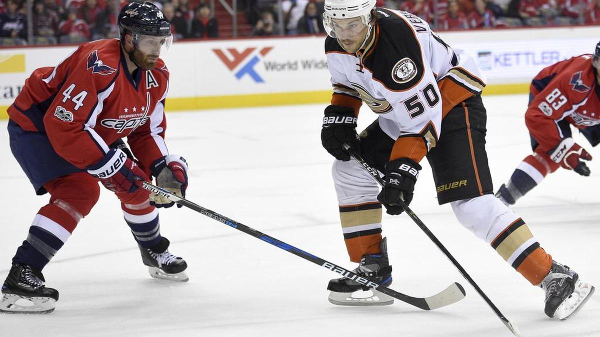 Anaheim Ducks center Antoine Vermette (50) skates with the puck against Washington Capitals defenseman Brooks Orpik (44) during the second period of an NHL hockey game, Saturday, Feb. 11, 2017, in Washington.