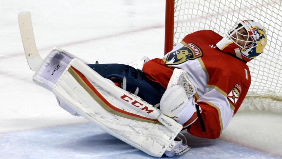 Florida goalie Roberto Luongo hits the ice after Pittsburgh’s Matt Cullen scored in the third period of a 5-1 win on Thursday.