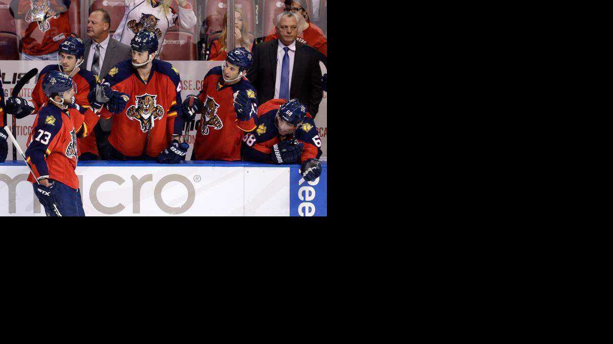 
Coming through: The Panthers’ Brandon Pirri is congratulated after scoring the game-winning goal against the Boston Bruins in a shootout Saturday. 
