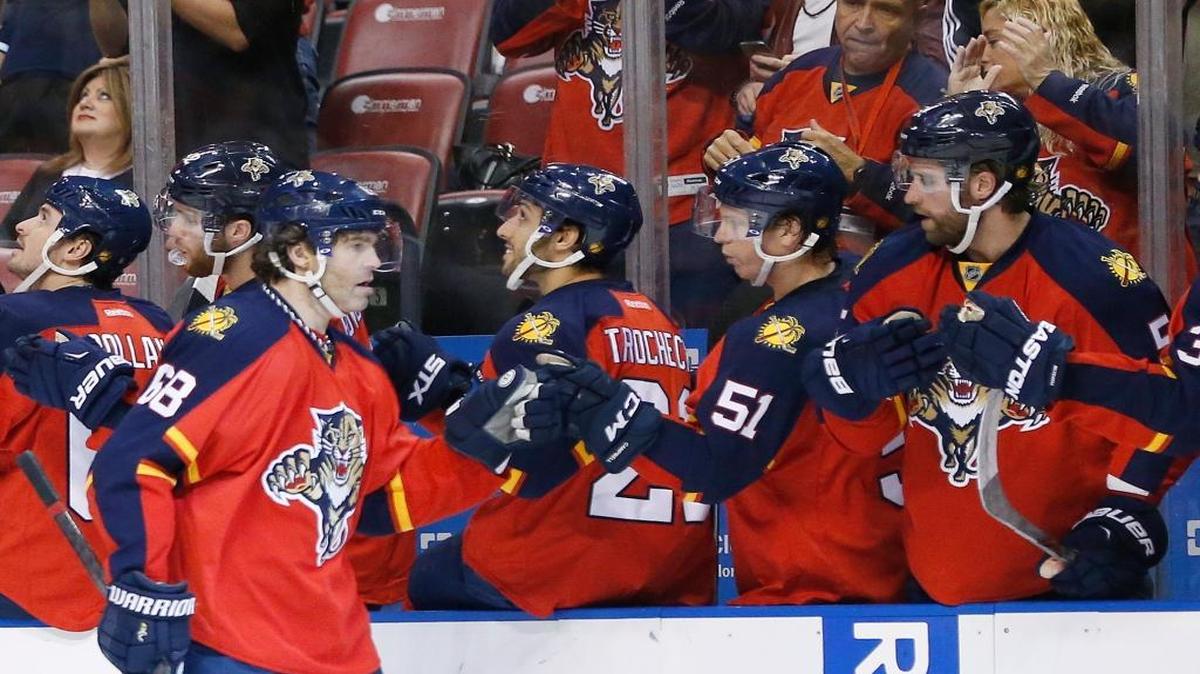 Florida Panthers right wing Jaromir Jagr (68) is congratulated by teammates after scoring during the first period of an NHL hockey game against the Washington Capitals, Thursday, Dec. 10, 2015, in Sunrise, Fla.