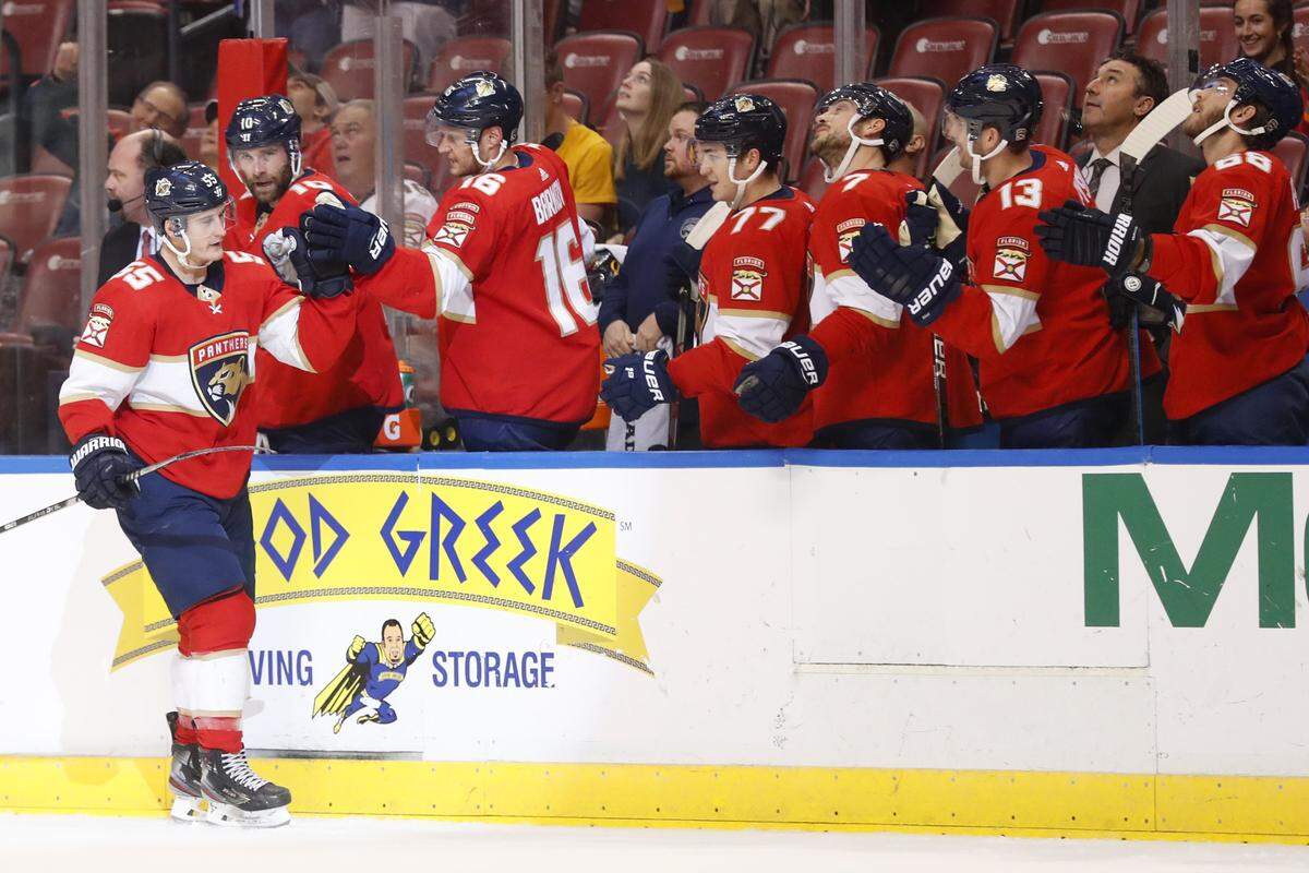 Florida Panthers center Noel Acciari (55) celebrates a goal with teammates during the first period of an NHL hockey game against the Ottawa Senators, Monday, Dec. 16, 2019 in Sunrise, Fla. (AP Photo/Wilfredo Lee)