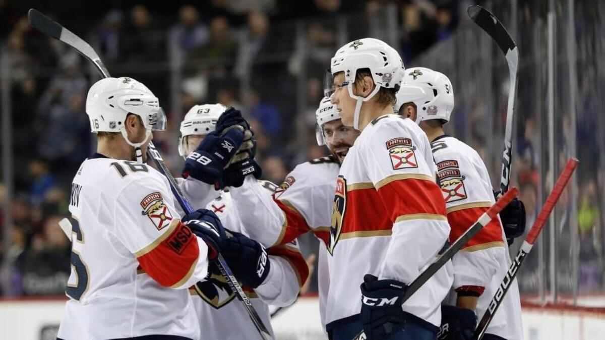 Panthers defenseman Keith Yandle, third from left, celebrates with teammates after scoring in the first period.