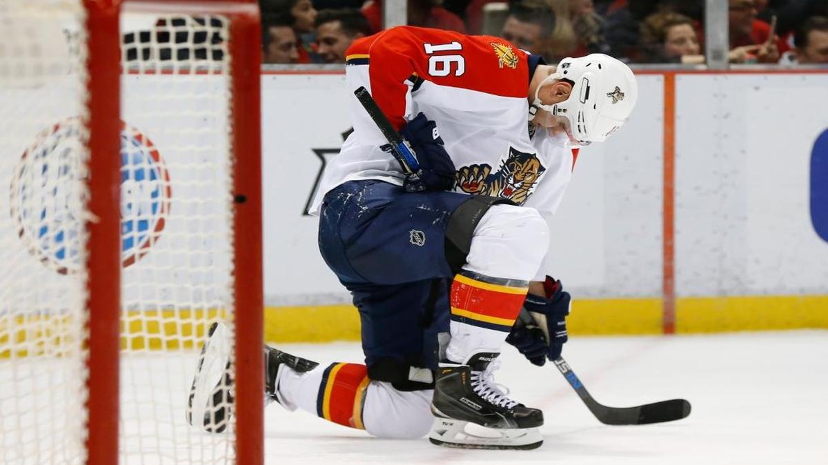 Florida Panthers center Aleksander Barkov (16) takes a knee after being checked against the Detroit Red Wings in the second period of an NHL hockey game, Monday, Feb. 8, 2016 in Detroit.