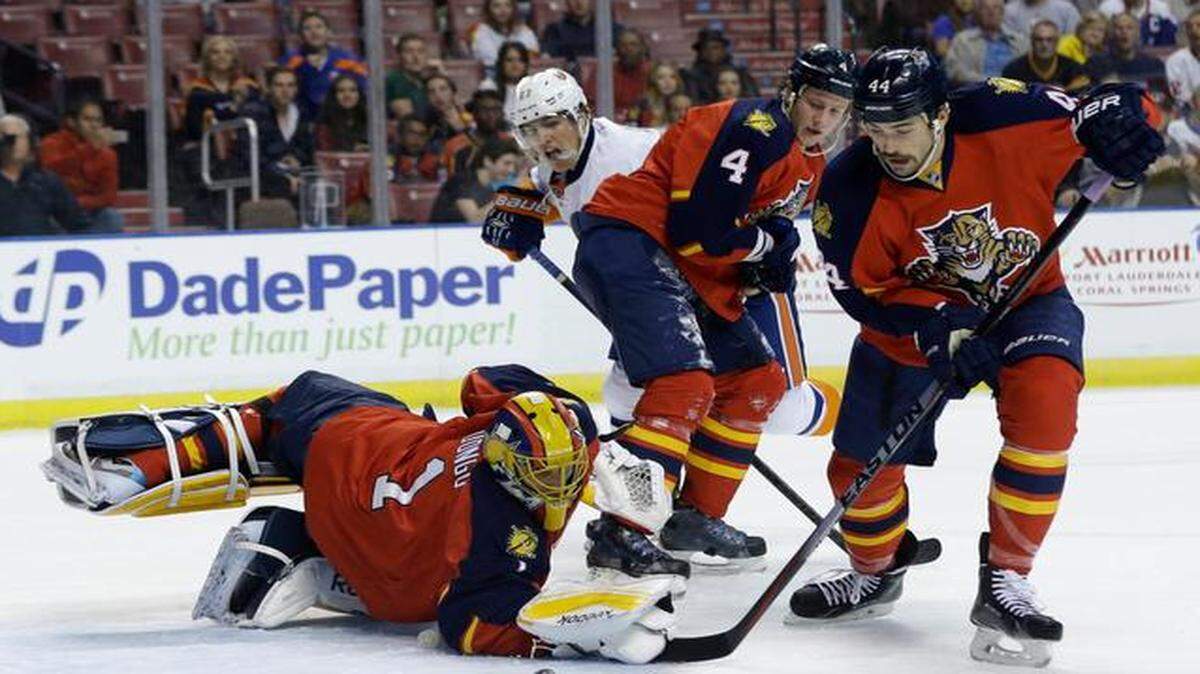 
Panthers goalie Roberto Luongo makes a stop in the first period of the New York Islanders’ 4-3 shootout victory on Friday, Nov. 14, 2014. 
