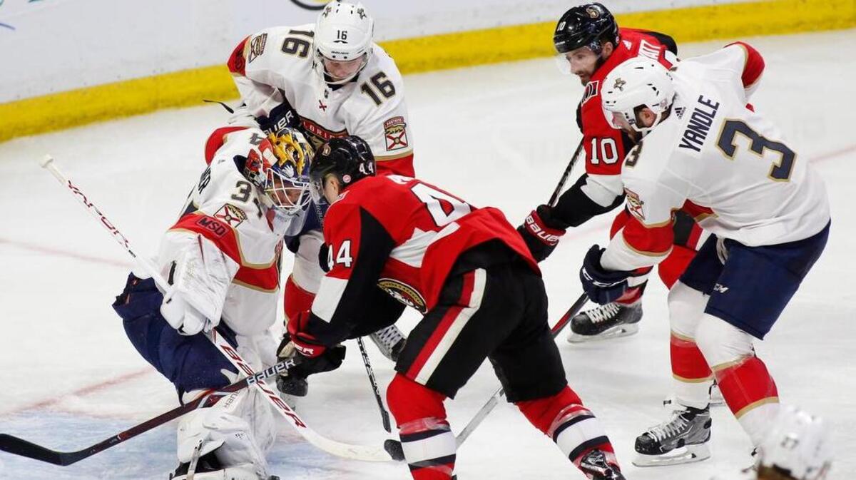 Florida Panthers goaltender James Reimer (34) stops a shot by Ottawa Senators center Jean-Gabriel Pageau (44) while Panthers center Aleksander Barkov (16), Senators left wing Tom Pyatt (10) and Panthers defenseman Keith Yandle (3) watch during Thursday’s game.
