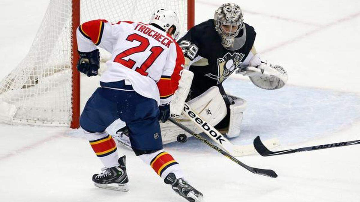 
Penguins goalie Marc-Andre Fleury makes one of his 45 saves on this shot by the Panthers’ Vincent Trocheck, but Trocheck did score Florida’s only goal.
