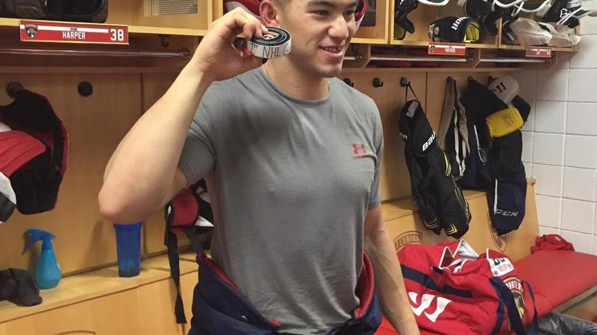 Shane Harper poses in the Florida Panthers locker room Saturday night after notching his first two NHL goals in a 5-2 win over Colorado.