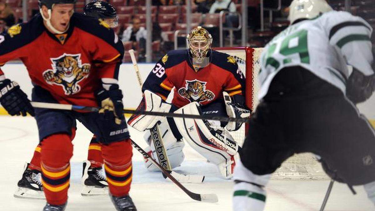 <cutline_leadin>Protecting the net:</cutline_leadin> Panthers goalie Dan Ellis gave up two goals in the first period of Wednesday night’s preseason opener, but stopped all five shots he faced in the second period.