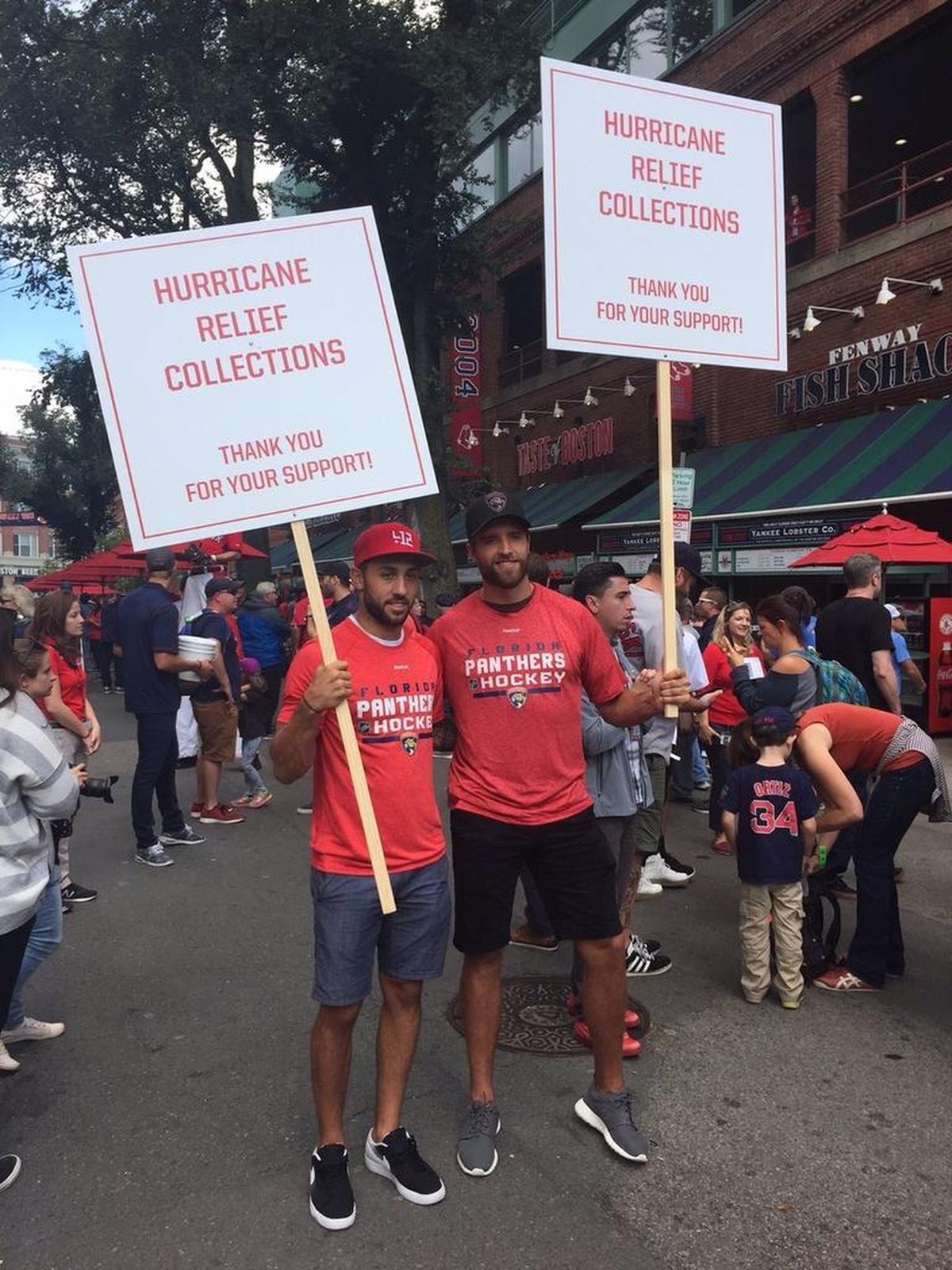 Florida Panthers players Vincent Trocheck and Aaron Ekblad collect hurricane relief funds outside Fenway Park in Boston on Sunday.
