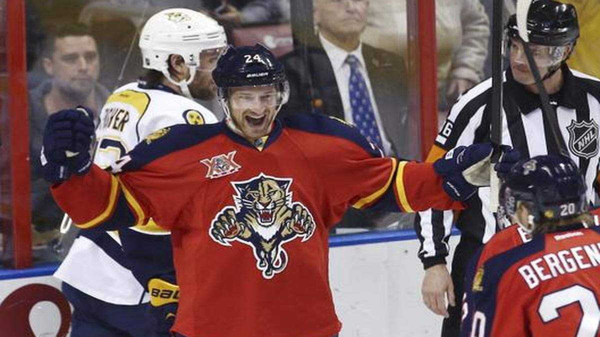 
Florida Panthers’ Brad Boyes celebrates after scoring against the Nashville Predators during the first period Saturday, Jan. 4, 2014, in Sunrise, Fla.
