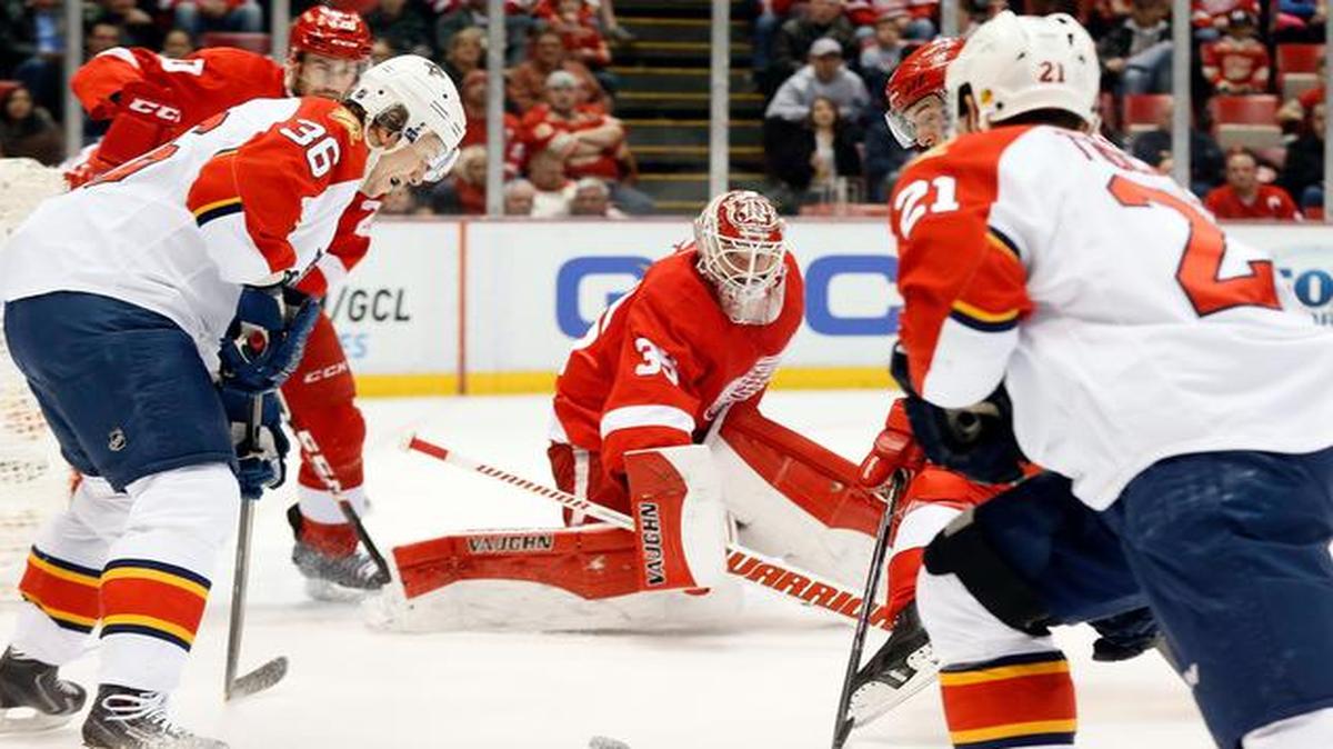 
Detroit Red Wings goalie Jimmy Howard (35) defends against the Florida Panthers in the first period of an NHL hockey game in Detroit Friday, Dec. 12, 2014.
