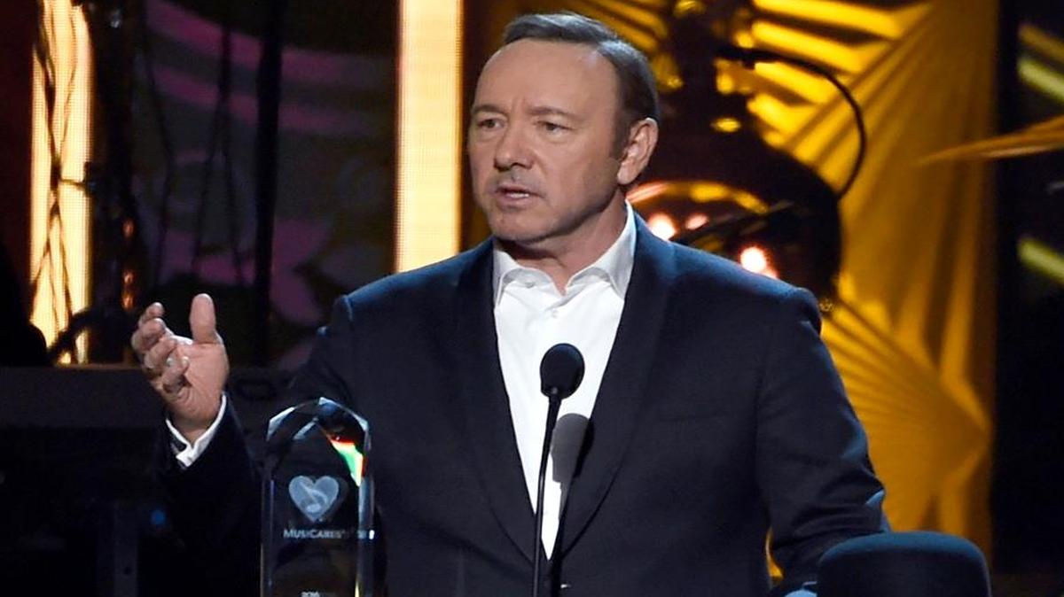 Kevin Spacey presents the Person of the Year award at the MusiCares Person of the Year tribute honoring Lionel Richie at the Los Angeles Convention Center on Saturday, Feb. 13, 2016.