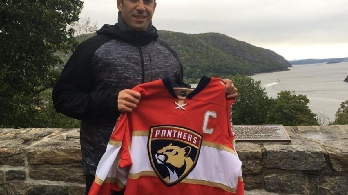 Derek MacKenzie accepts the Florida Panthers’ captaincy during a team ceremony Sunday in West Point, N.Y.