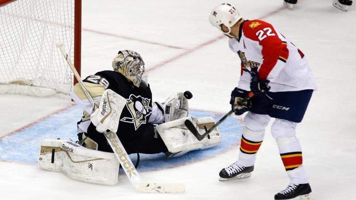 
Nice save: Penguins goalie Marc-Andre Fleury stops Shawn Thornton in the first period Sunday. 

