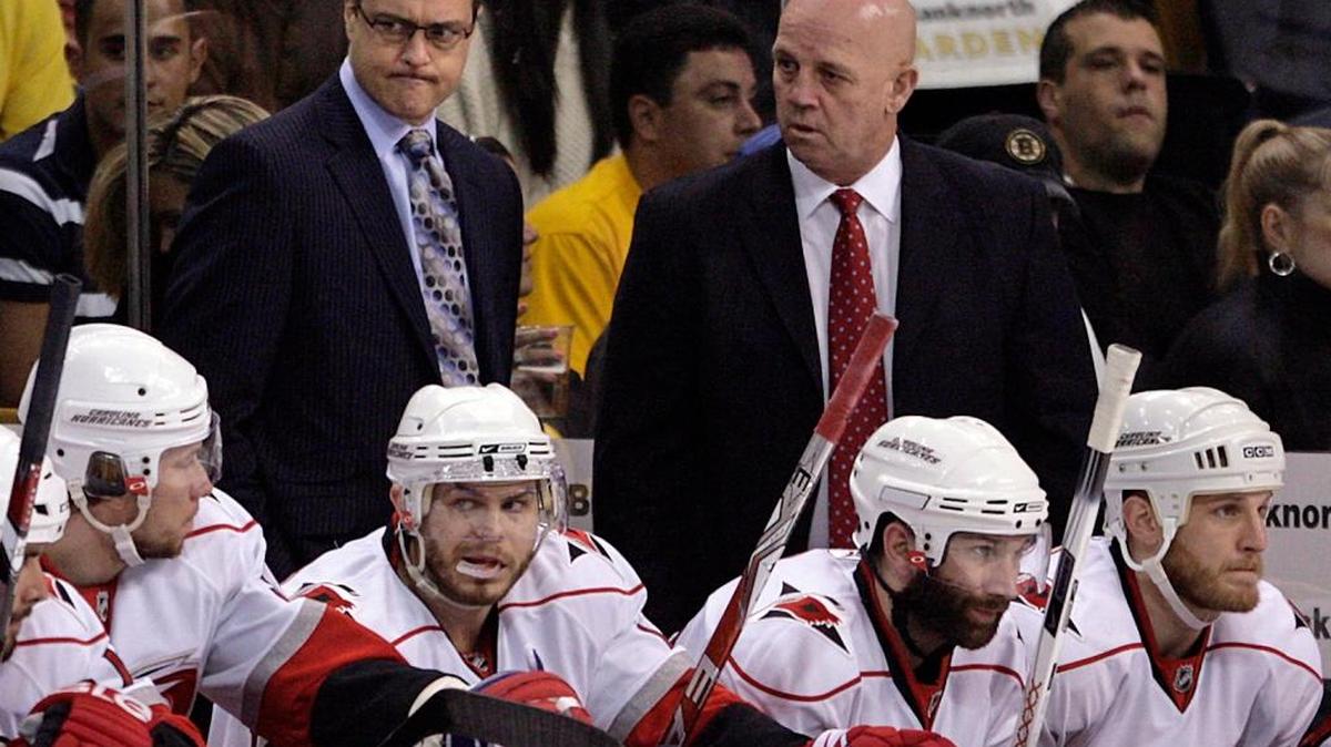 In 2012, Tom Rowe, right, was hired as coach of the new Yaroslavl Lokomotiv team as they re-entered the KHL a year after their program was decimated when their team plane crashed on takeoff heading to a game in Minsk, Belarus.