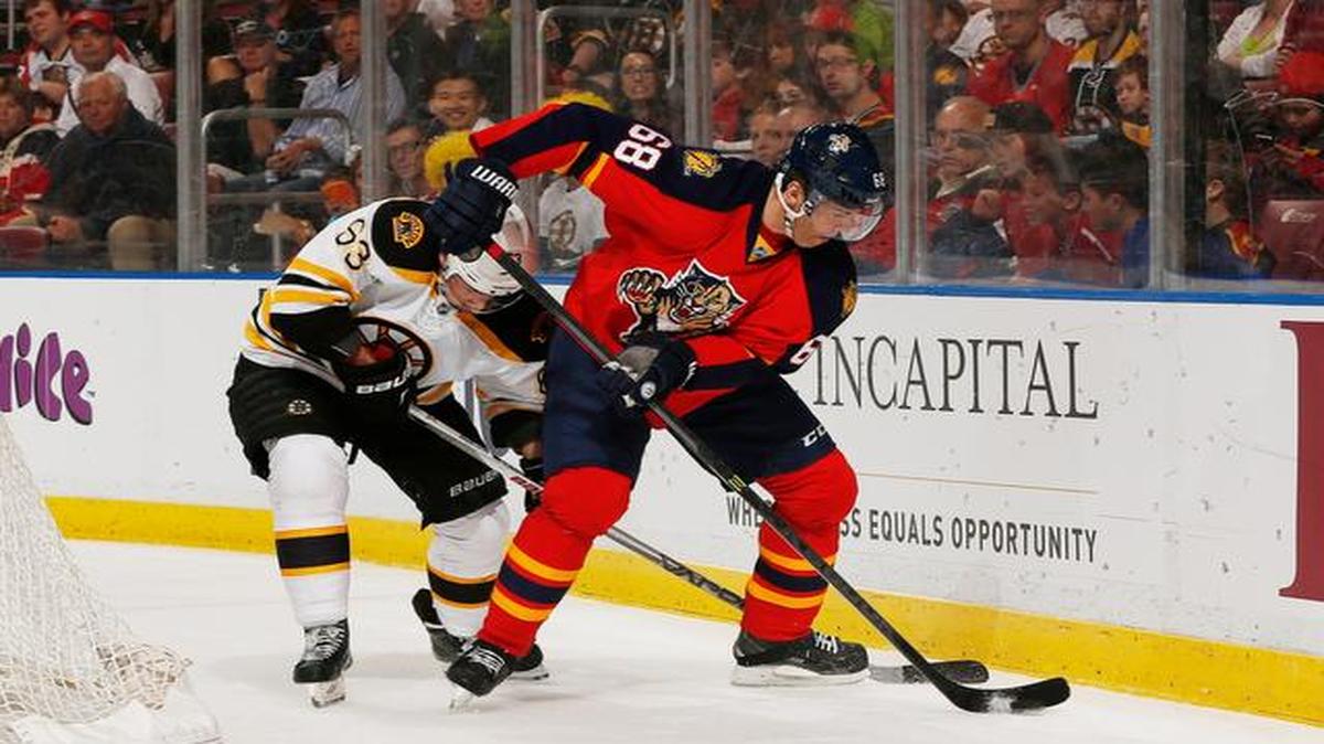 
Jaromir Jagr #68 of the Florida Panthers and Brad Marchand #63 of the Boston Bruins battle for control of the puck during first period action at the BB&T Center on April 9, 2015 in Sunrise, Florida. 
