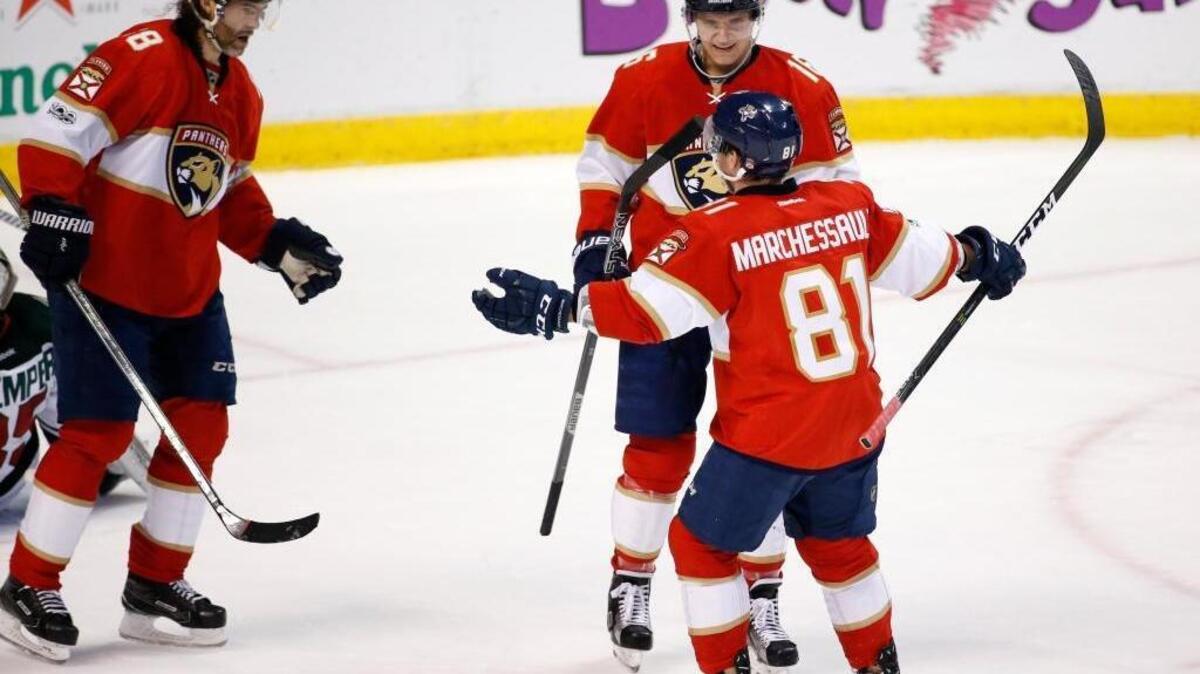 Florida Panthers center Jonathan Marchessault (81) is congratulated by right wing Jaromir Jagr (68) and center Aleksander Barkov (16) after scoring during the first period of an NHL hockey game against the Minnesota Wild, Friday, March 10, 2017, in Sunrise, Fla.