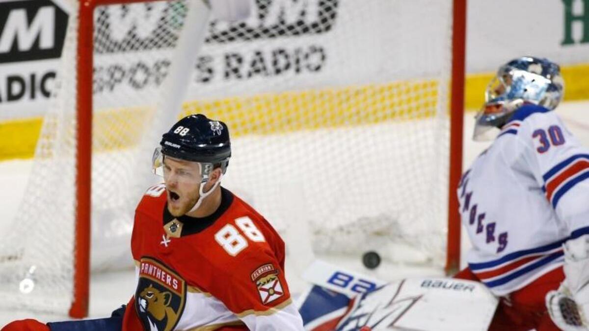 Florida Panthers left wing Jamie McGinn (88) celebrates after scoring against New York Rangers goaltender Henrik Lundqvist (30) during the third period of an NHL hockey game Saturday, March 10, 2018, in Sunrise, Fla. The Panthers won 4-3 in a shootout.