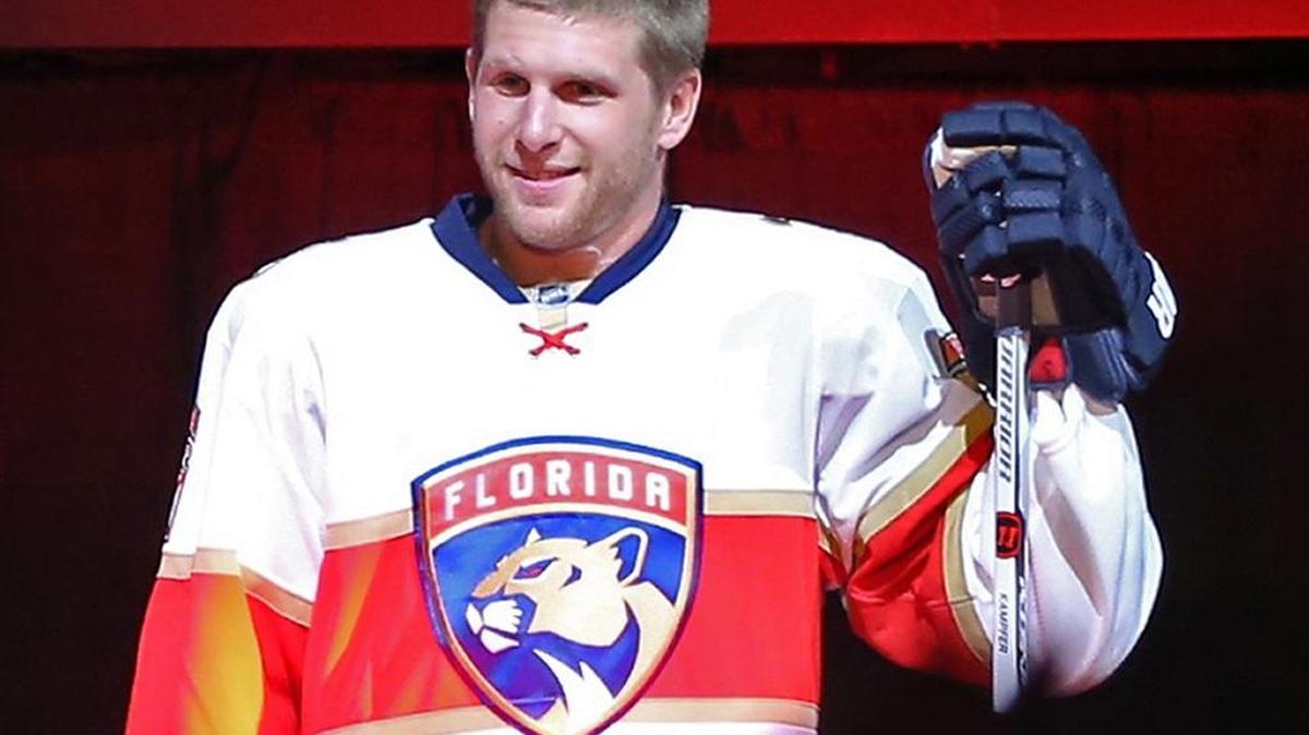 Steven Kampfer shows off the new Florida Panthers uniform at a ceremony at BB&T Center in June.