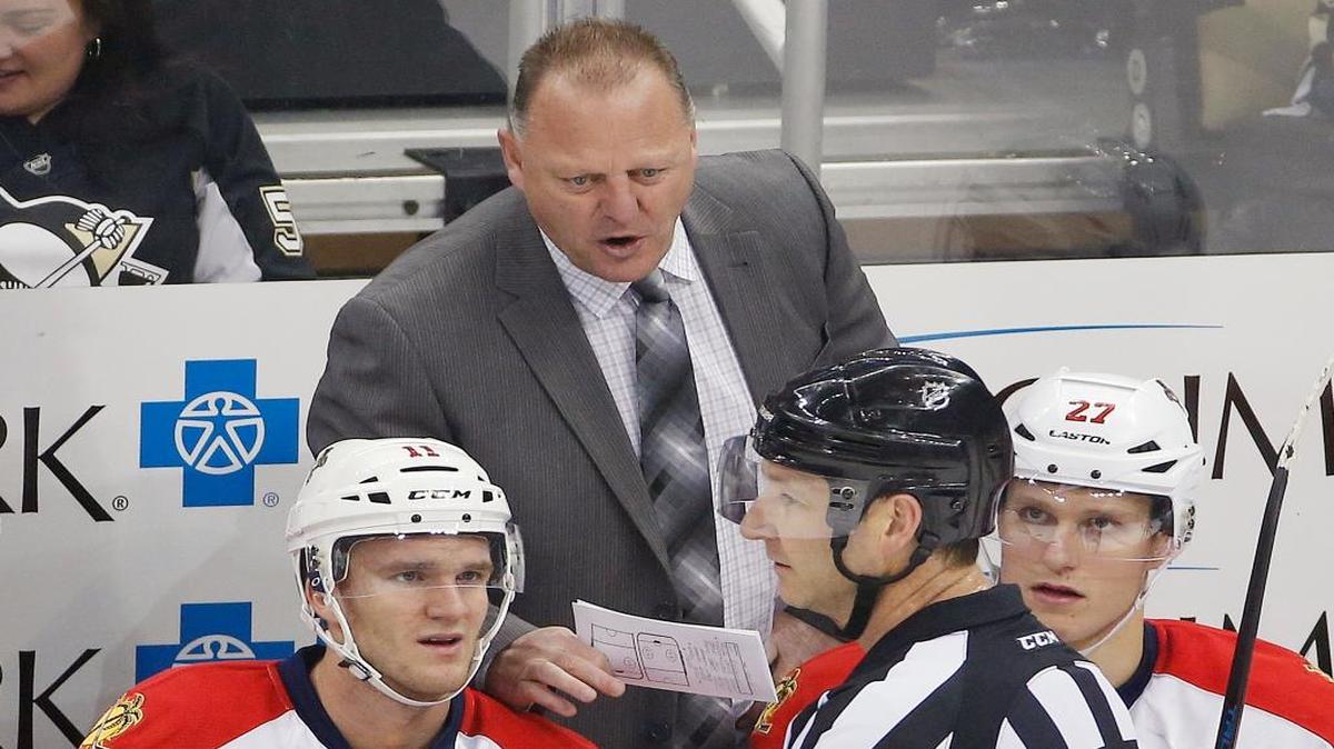 File photo: Florida Panthers head coach Gerard Gallant, top, talks with referee Steve Kozari (40) during the first period of an NHL hockey game against the Pittsburgh Penguins in Pittsburgh, Saturday, Dec. 20, 2014.