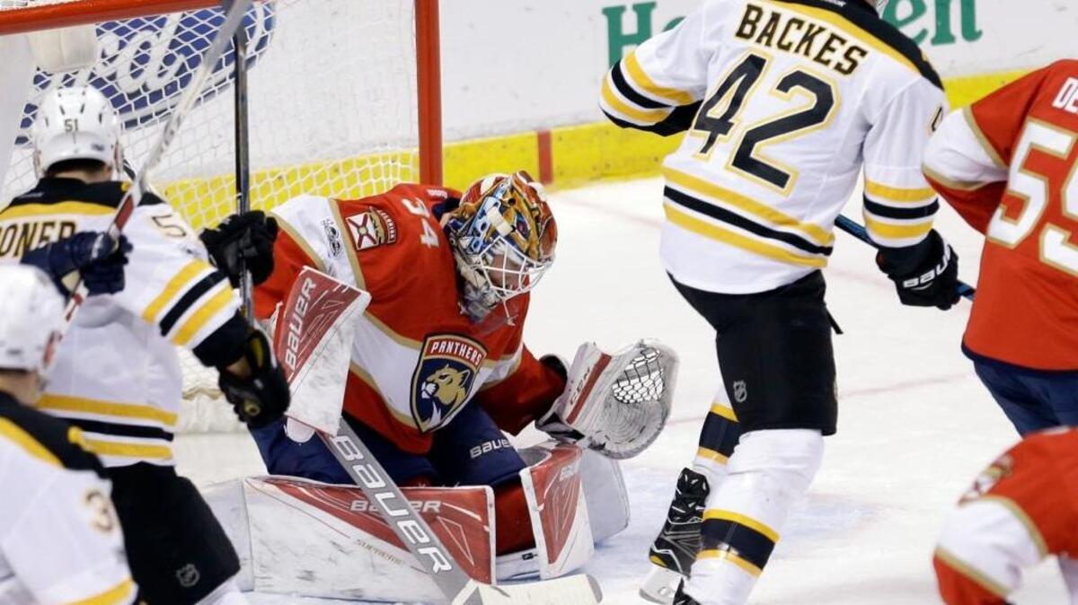 Boston’s David Backes gives the Bruins a 2-0 lead over James Reimer in Saturday’s 4-0 win over the Panthers at BB&T Center.