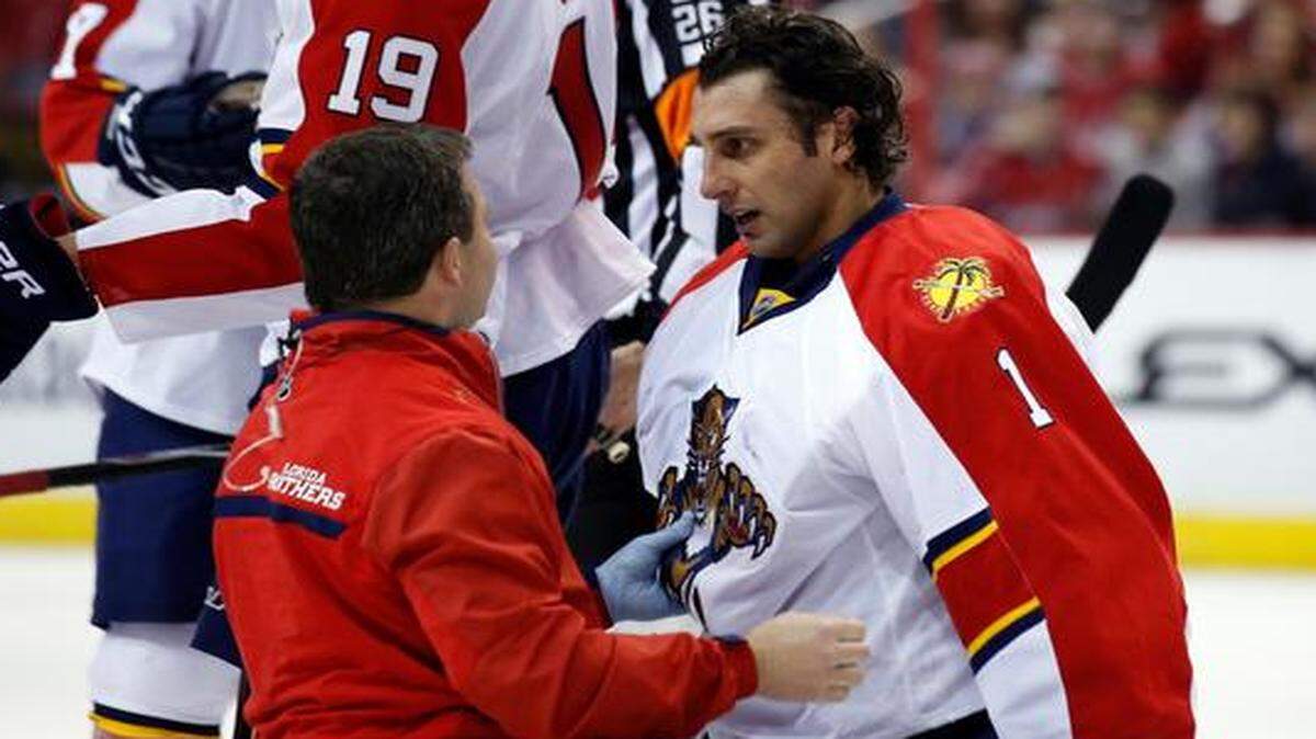 
Florida Panthers goalie Roberto Luongo is checked after colliding with Washington Capitals left wing Alex Ovechkin on Sunday, Jan. 4, 2015, in Washington. 
