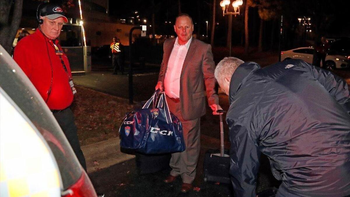 Former Florida Panthers coach Gerard Gallant loads his bags into a taxi after being fired following Sunday’s 3-2 loss to the Carolina Hurricanes in Raleigh, N.C.