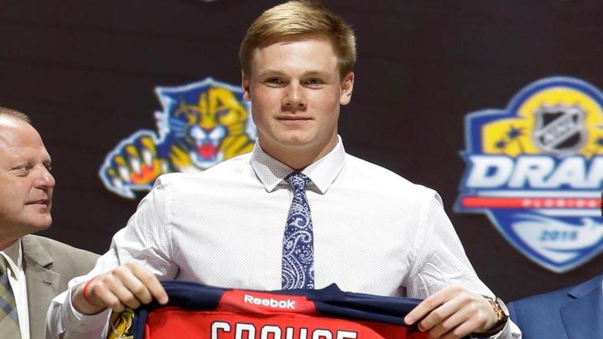 
Lawson Crouse holds up a Florida Panthers sweater after being chosen 11th overall during the first round of the NHL hockey draft, Friday, June 26, 2015, in Sunrise, Fla. 
