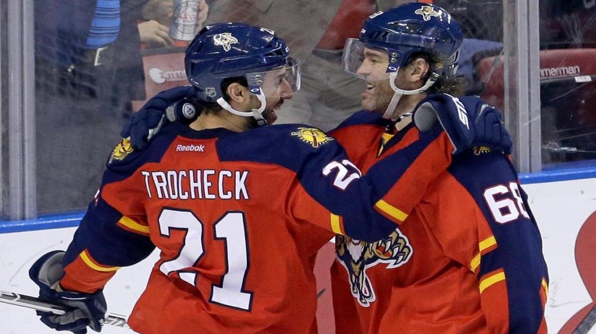Florida Panthers right wing Jaromir Jagr (68) is congratulated by teammate Vincent Trocheck (21) after Jagr scored against the Detroit Red Wings during the third period of an NHL hockey game, Thursday, Feb. 4, 2016, Sunrise, Fla. The Panthers won 6-3.