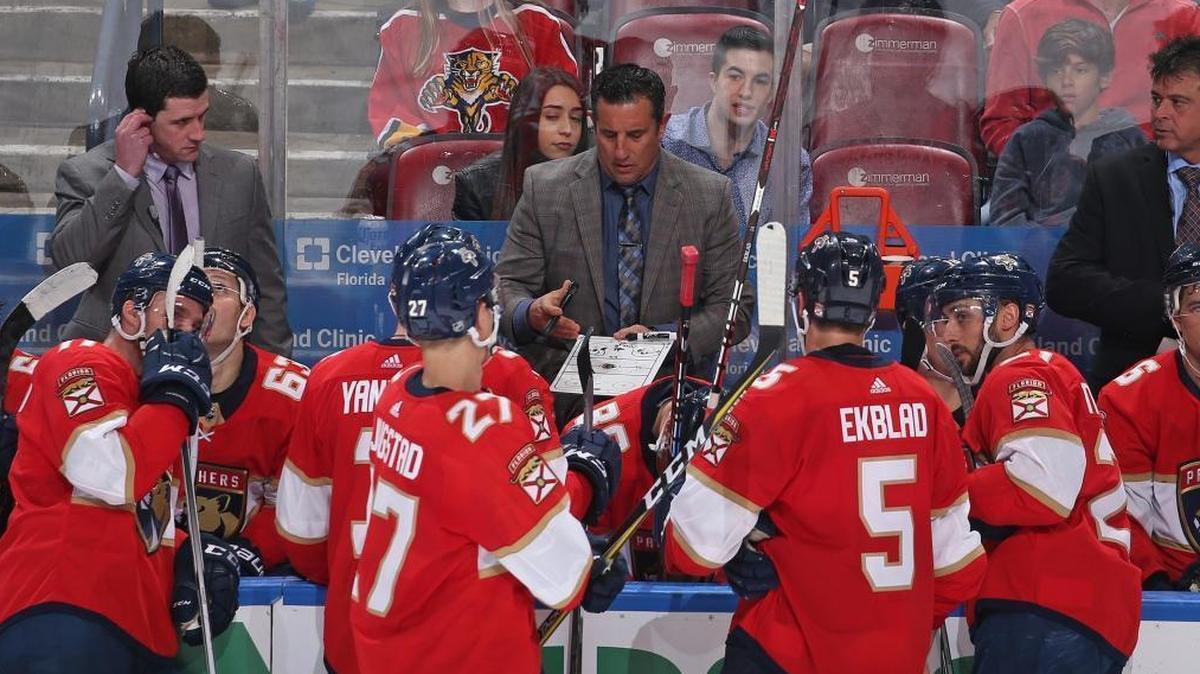 Florida Panthers head coach Bob Boughner, center, directs his players during a timeout in the third period of a game against the Philadelphia Flyers on Dec. 28, in Sunrise. The Panthers’ Thursday game against the Bruins has been postponed due to a severe winter storm in the Northeast.
