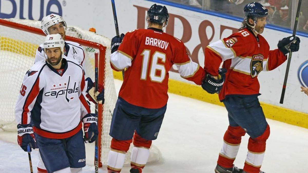 Sasha Barkov, left, celebrates with Jaromir Jagr after he scored his 750th goal of his career — and first of the season — against the Capitals on October 20.