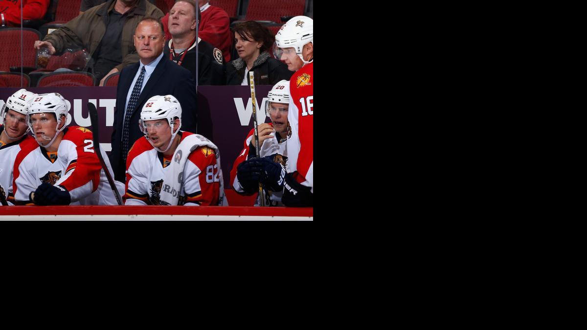 
 Head coach Gerard Gallant of the Florida Panthers watches from the bench during the NHL game against the Arizona Coyotes at Gila River Arena on October 25, 2014 in Glendale, Arizona. 
