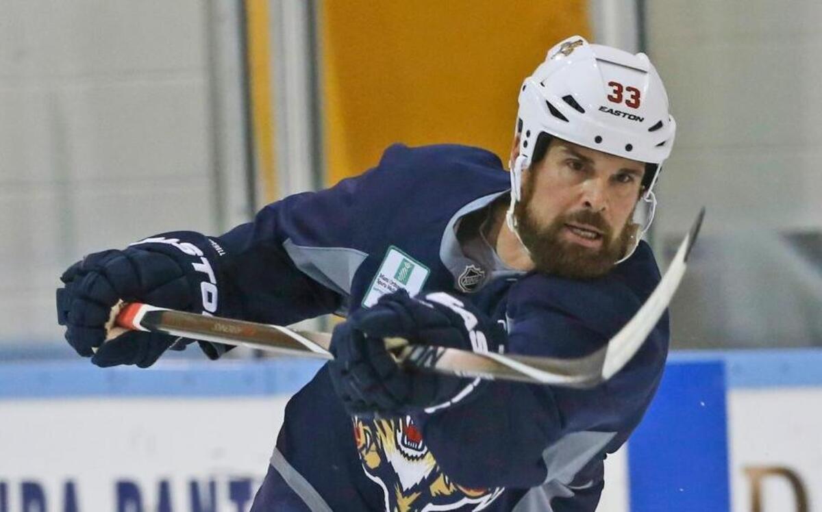 Florida Panthers defenseman Willie Mitchell takes a shot during a practice session, Tuesday, April 12, 2016, at the Panthers' practice facility in Coral Springs, Fla.