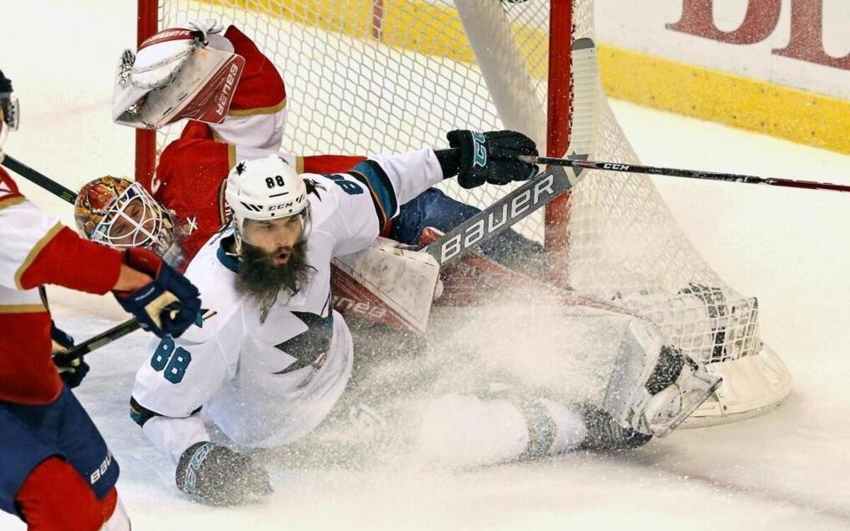 Florida Panthers goalie James Reimer is scored on by San Jose Sharks Brent Burns as he slides into the net in the first period at the BB&T Center in Sunrise, Florida on Thurs., Nov. 10, 2016.