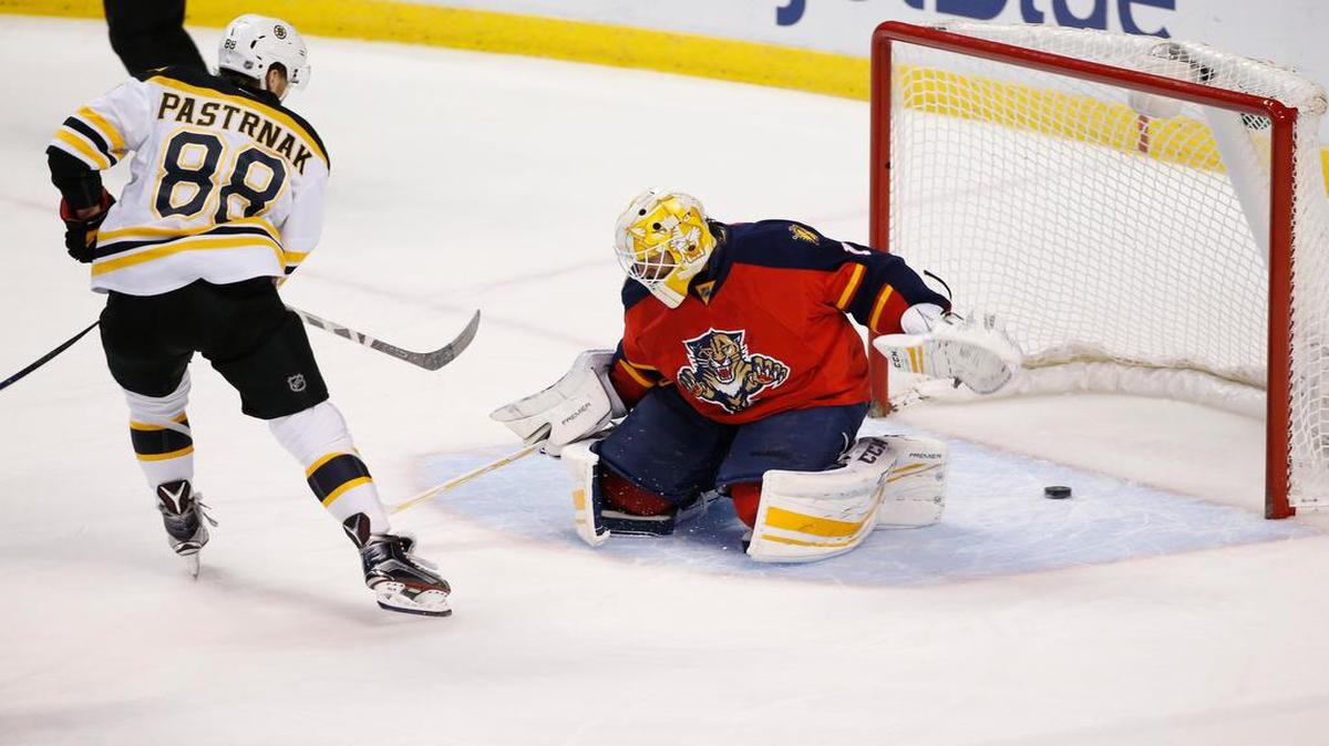 The Bruins’ David Pastrnak scores against Panthers goalie Roberto Luongo, one of four goals Luongo gave up in the first period before he was pulled.