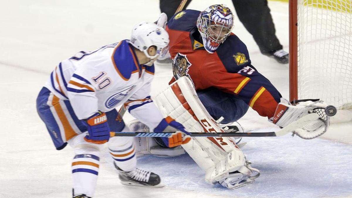 Florida Panthers goalie Al Montoya (35) saves a shot by Edmonton Oilers right wing Nail Yakupov (10) during the third period Monday, Jan. 18, 2016, in Sunrise, Fla. The Oilers won 4-2.