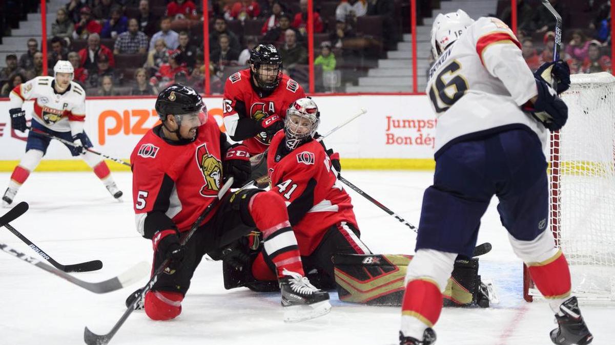 The Panthers’ Aleksander Barkov blasts the puck past Senators goaltender Craig Anderson in the first period.
