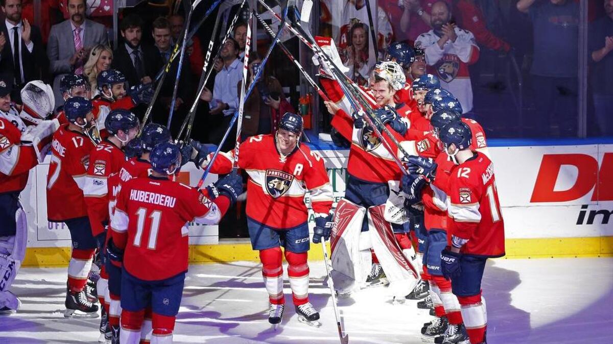 Florida Panthers right wing Shawn Thornton (22) receives a "stick salute" from teammates after an NHL hockey game against the Buffalo Sabres, Saturday, April 8, 2017, in Sunrise, Fla. Thornton played in his last NHL game Saturday.