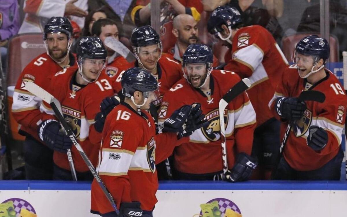 The Panthers celebrate after Florida Panthers center Aleksander Barkov (16) scores against Carolina Hurricanes goalie Cam Ward (30) as the Panthers win in a shoot out 3-2 as the Florida Panthers play the Carolina Hurricanes at the BB&T Center in Sunrise on Tues., Feb. 28, 2017.