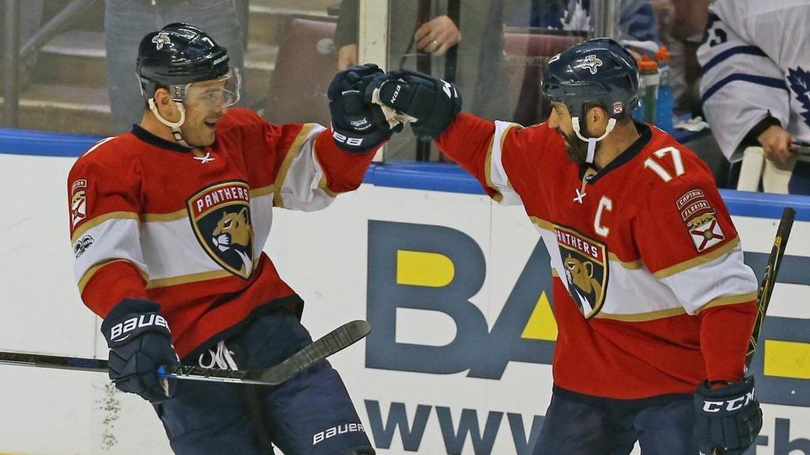 Colton Sceviour and Derek MacKenzie celebrate after Florida took a 2-0 lead on Toronto on Tuesday night at the BB&T Center.