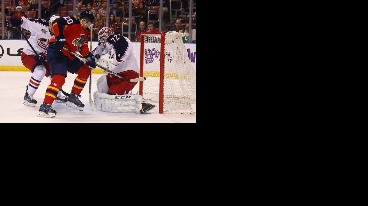 
Columbus goaltender Sergei Bobrovsky stops Sean Bergenheim for one of his 55 saves in the Blue Jackets’ 4-3 win against the Panthers. 
