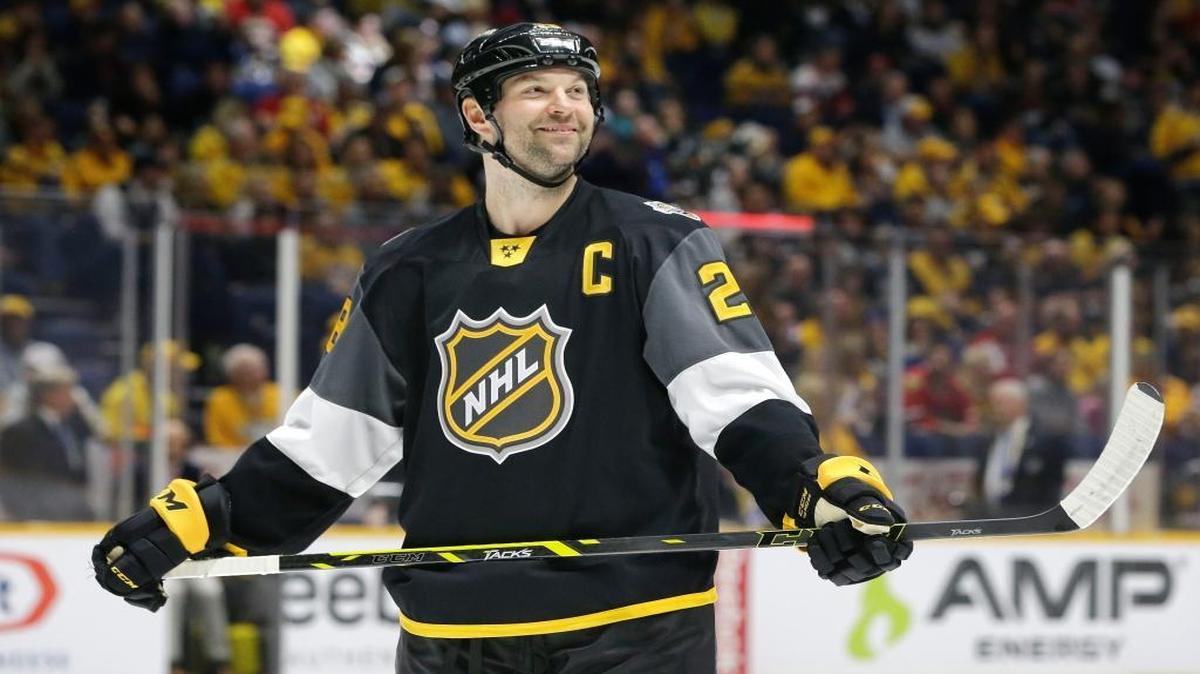 Pacific Division forward John Scott looks into the stands during the NHL hockey All-Star championship game against the Atlantic Division Sunday, Jan. 31, 2016, in Nashville, Tenn. The Pacific Division won 1-0 and Scott was named most valuable player.