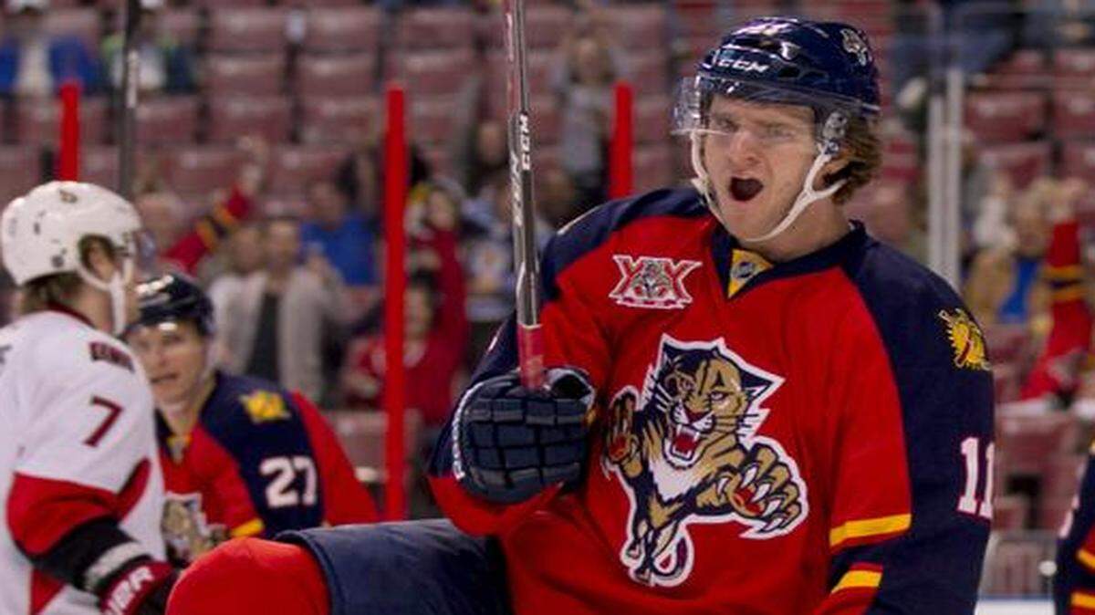 
Florida Panthers center Jonathan Huberdeau celebrates a goal against the Washington Senators on Dec. 3, 2013.
