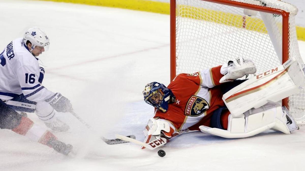 Florida goalie Roberto Luongo blocks a shot by Toronto’s Mitchell Marner during the first period on Wednesday at BB&T Center.