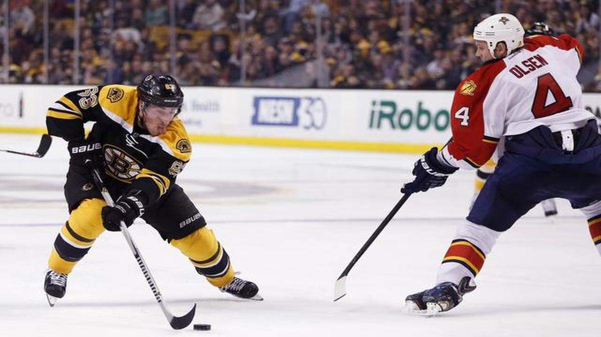 
Dylan Olsen tries to cut off the Bruins’ Brad Marchand in the Panthers’ OT loss on Nov. 4.
