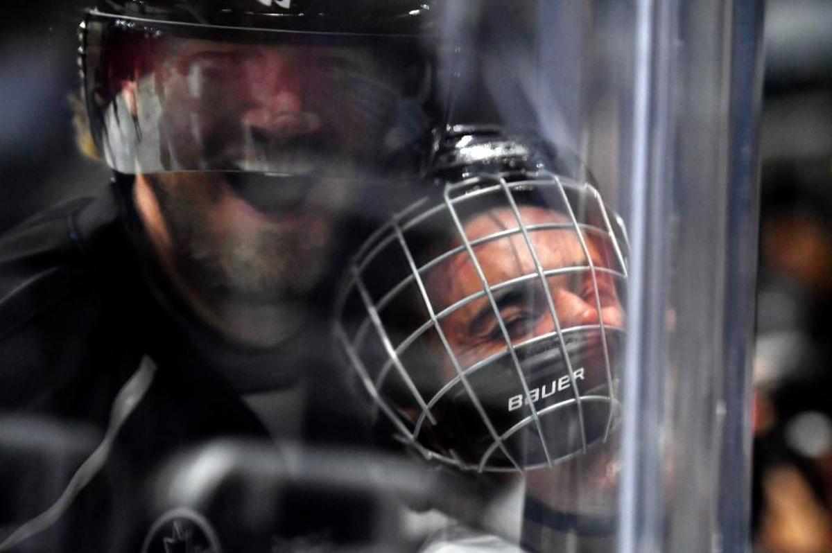 Singer Justin Bieber is pushed into the glass by Chris Pronger during the first period of the NHL All-Star Celebrity Shootout at Staples Center on Jan. 28, 2017 in Los Angeles.