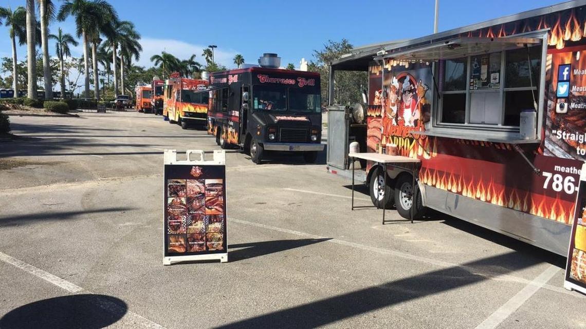 Food trucks line up at BB&T Center on Wednesday afternoon as JetBlue and the Florida Panthers gave out over 10,000 meals. The trucks are back at the hockey arena on Thursday.
