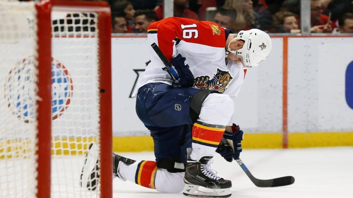 Florida Panthers center Aleksander Barkov (16) takes a knee after being checked against the Detroit Red Wings in the second period of an NHL hockey game, Monday, Feb. 8, 2016 in Detroit.