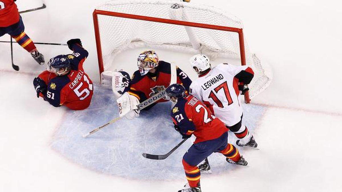 
Florida Panthers goaltender Al Montoya (35) looks to his right after stopping a shot by Ottawa Senators forward David Legwand (17) during the third period of an NHL hockey game, Friday, Nov. 28, 2014, in Sunrise, Fla. The Panthers defeated the Senators 3-2. 
